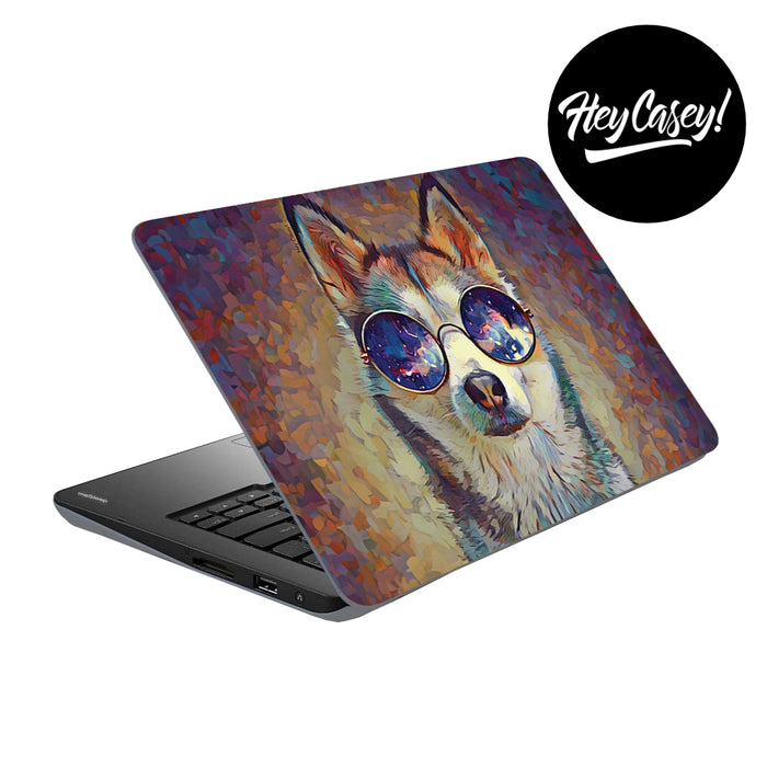 vinyl laptop skin with a design of a husky wearing sunglasses