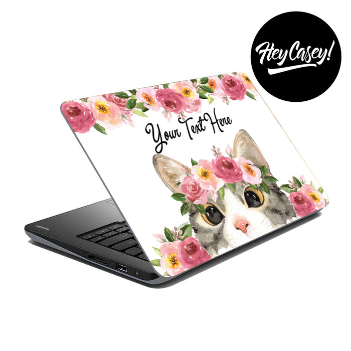 vinyl laptop skin with a watercolour design of a cat with flowers