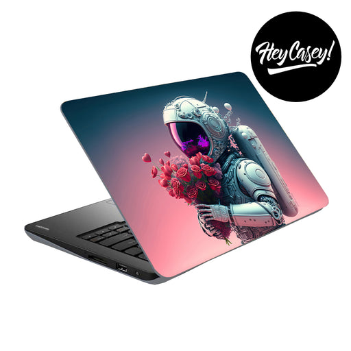 vinyl laptop skin with design of a robotic astonaut holding a bunch of red roses and hearts