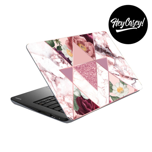 vinyl laptop skin with a floral and marble geometric design