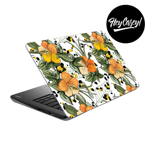 vinyl laptop skin with design of yellow and orange hibiscus flowers and leaves