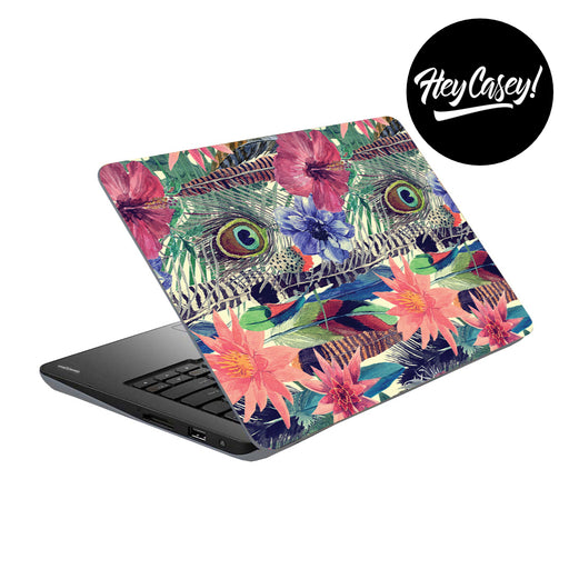 vinyl laptop skin with a floral and feather design, including peacock feathers and waterlillies