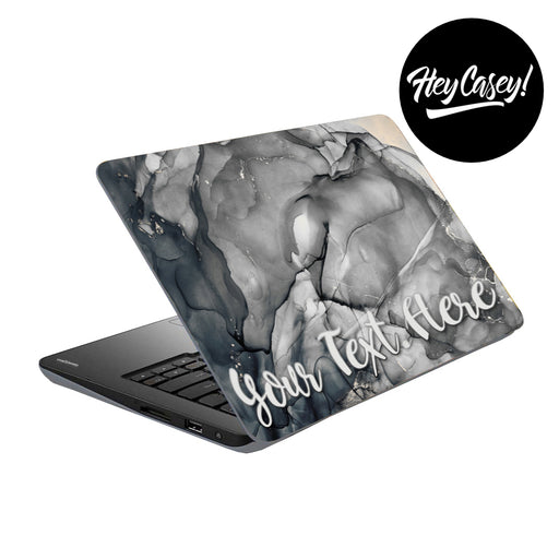 vinyl laptop skin with a blank marbled ink design and place to add your own text