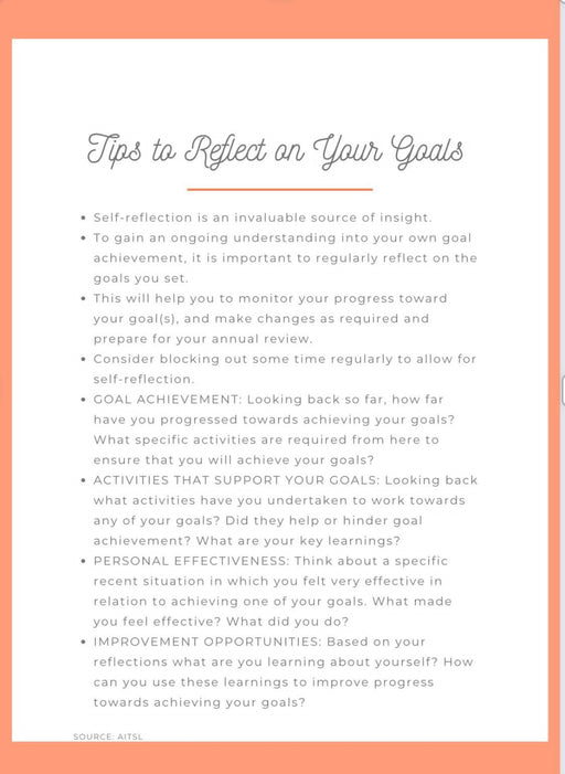 journal with place to reflect on goals