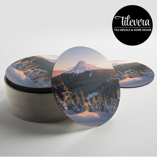 Set of coasters with a snowy mountain design